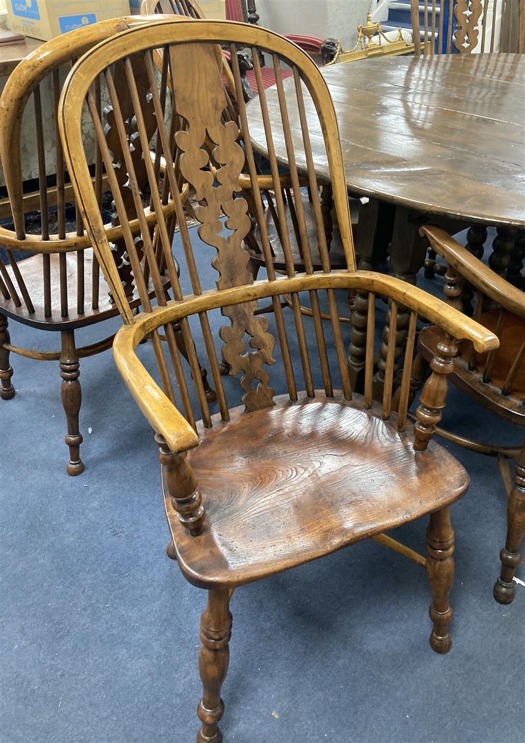 A set of eight 19th century and later Yorkshire area yew, elm and ash Windsor armchairs